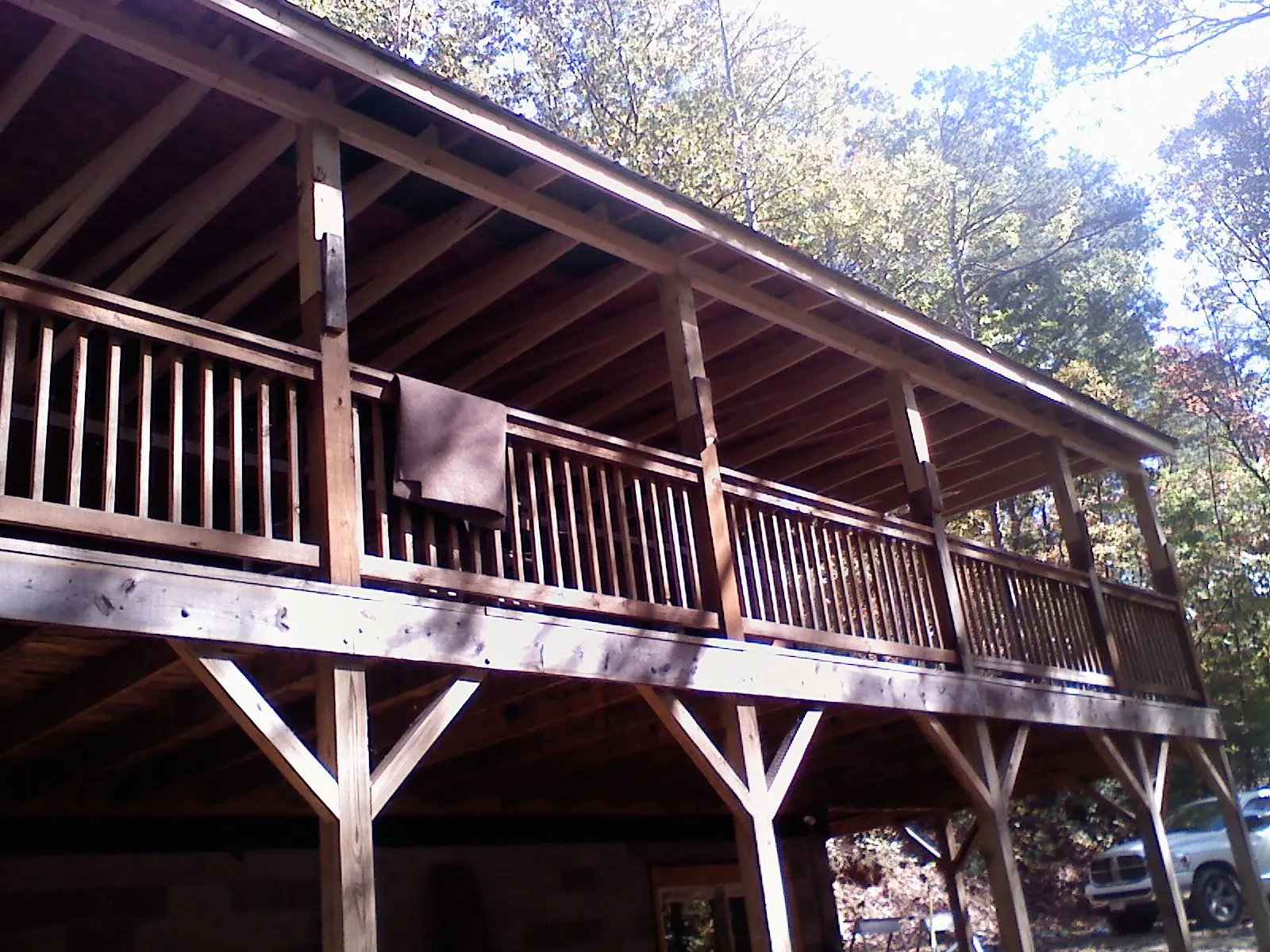 Timber framing under a new elevated porch and deck — Roof Leak Repair in Peachtree City by Roofing Brothers